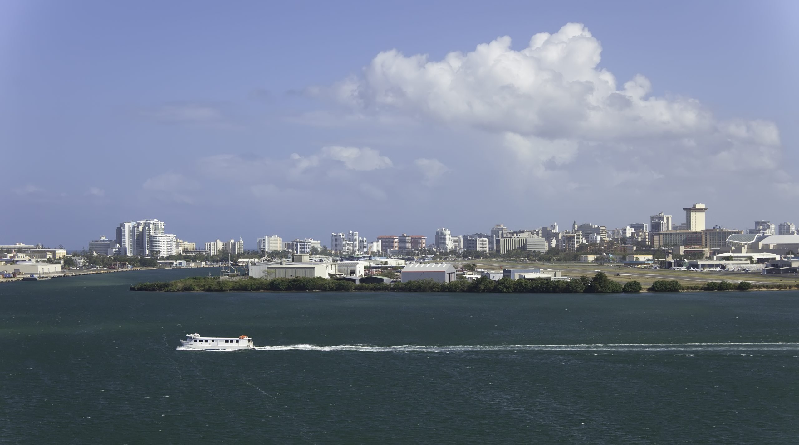 Small Ferry sails along San Juan Harbor, Puerto Rico